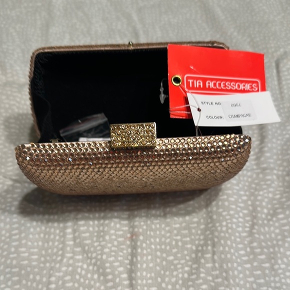 TIA accessories Handbags - TIA Accessories Gold Clutch Bag